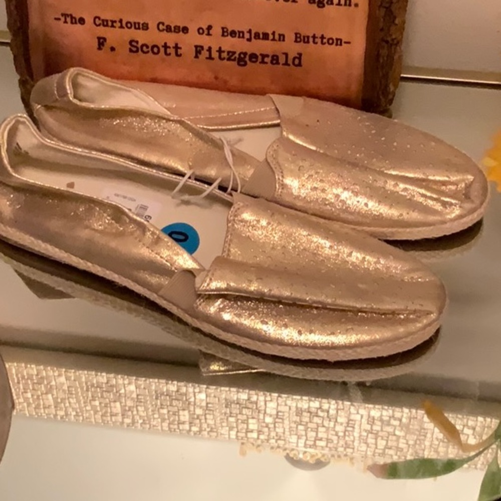 Report gold slip ons